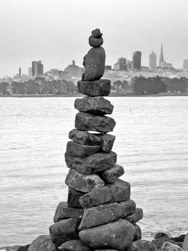 Carfefully balanced pile or rocks on beach