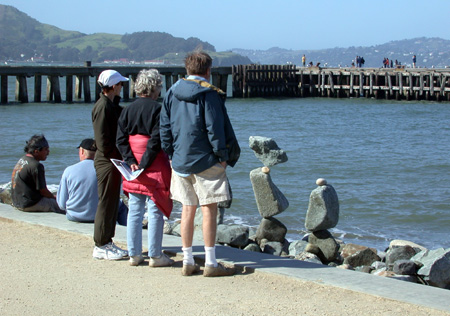 Some admirers looking at the rocks