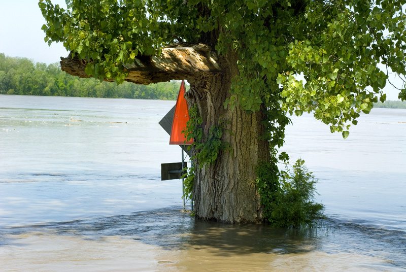 flooded flood warning sign