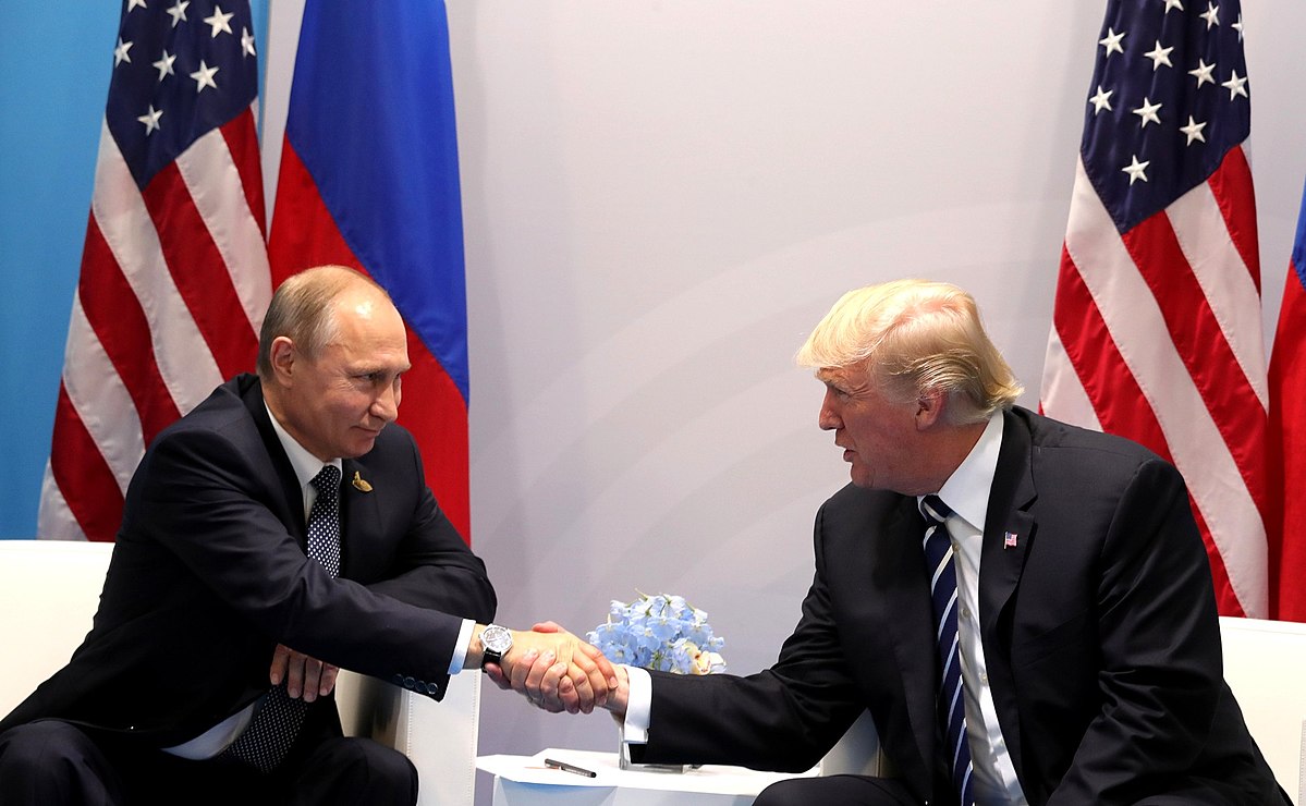 Putin and Trump shaking hands