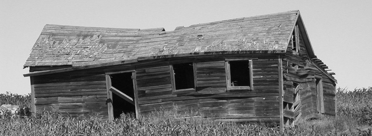 B & W photo of old cabin