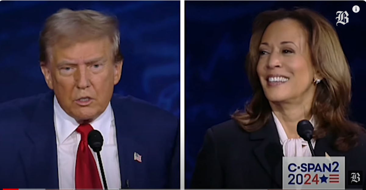 screenshot of debate showing Trump on left, scowling, Harris on right, bit smile on her face