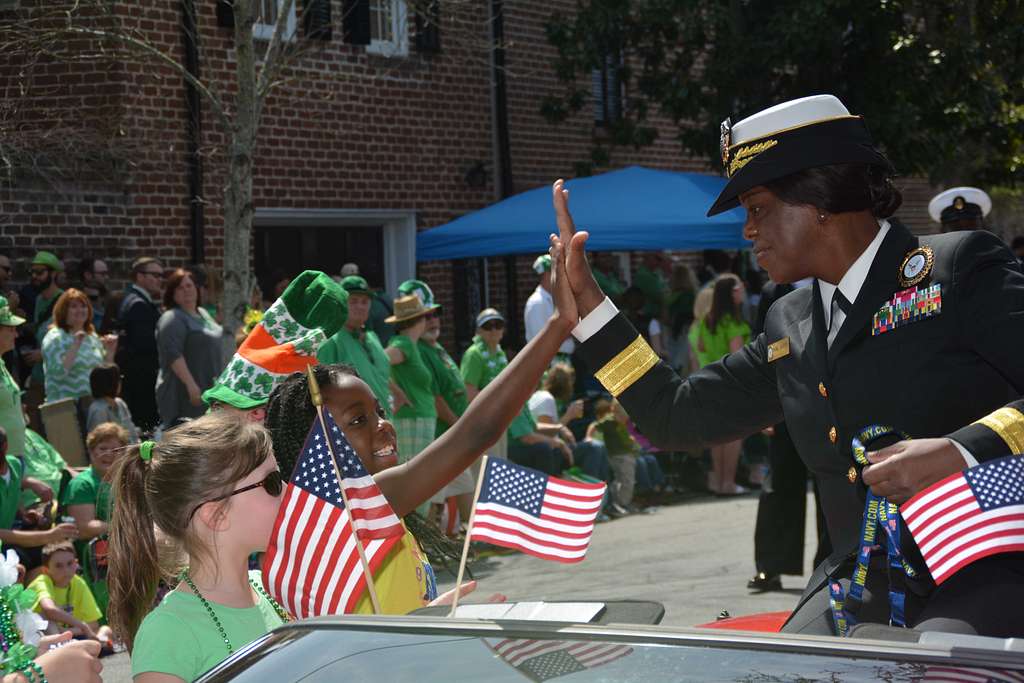 Rear Adm. Annie B. Andrews gets high five during 191st St. Patrick's Day parade in Savannah